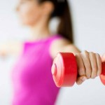 woman-holding-dumbbellD184