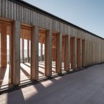 mirko-franzoso-architetto-casa-sociale-caltron-social-house-cles-trentino-italy-designboom-04-694×464