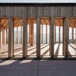 mirko-franzoso-architetto-casa-sociale-caltron-social-house-cles-trentino-italy-designboom-05-694×464